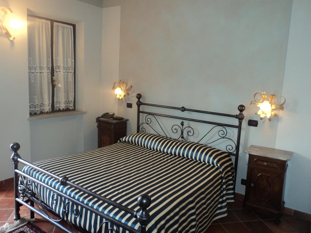 Agriturismo Cascina L'Arche Санто-Стефано-Бельбо Номер фото